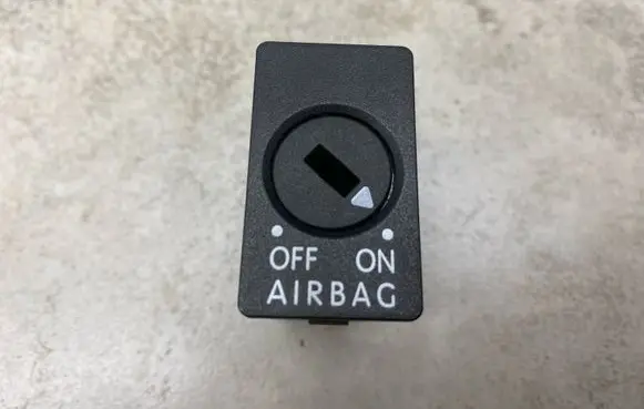 Passenger airbag on/off switch