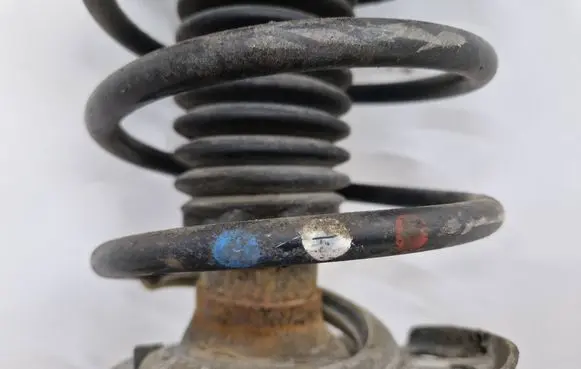 Peugeot 208 Front shock absorber with coil spring 9804831180