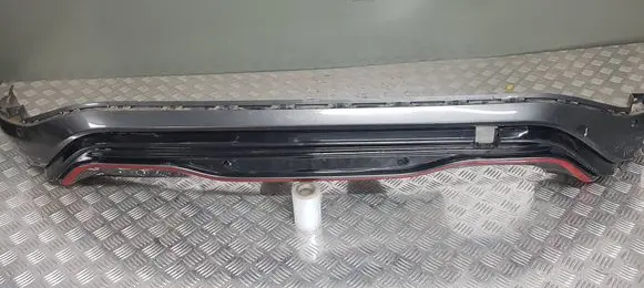 Rear bumper trim bar molding