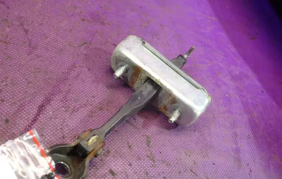 Toyota Corolla E120 E130 Front door check strap stopper 