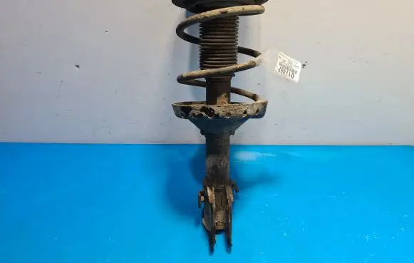 Subaru Legacy Front shock absorber with coil spring