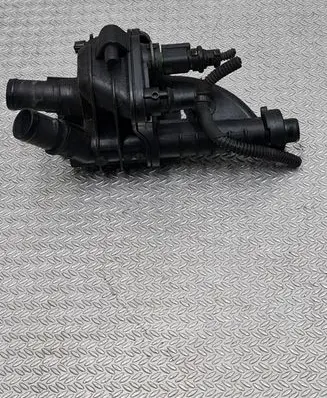 Thermostat/thermostat housing