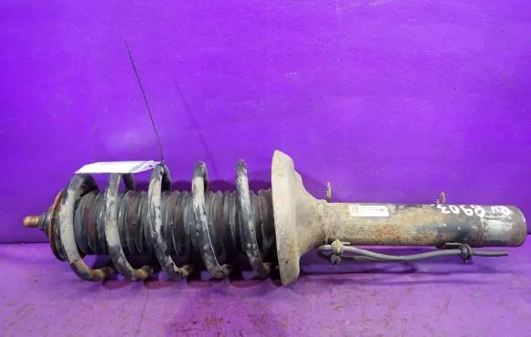 Volkswagen Golf IV Front shock absorber with coil spring 1J0413031BH