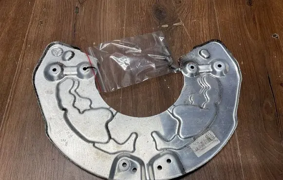 Mercedes-Benz E W213 Front brake disc dust cover plate A0004213520