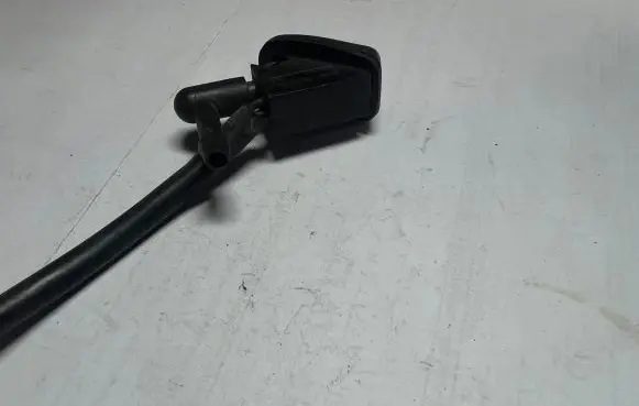 Ford Focus Windshield washer spray nozzle 4M5117666A