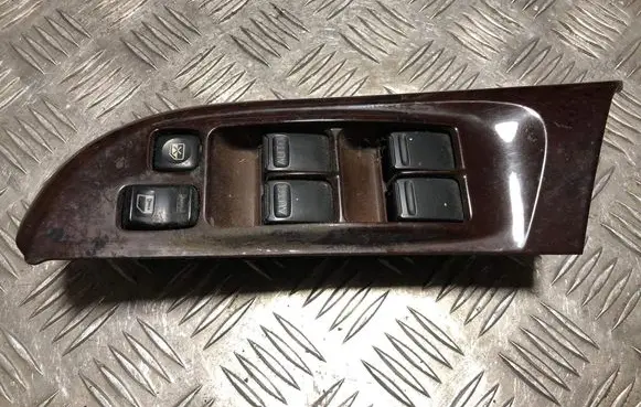 Nissan Maxima Front door window switch trim 809612Y100