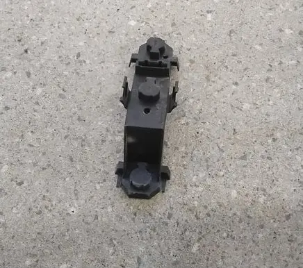 Tail light bulb cover holder