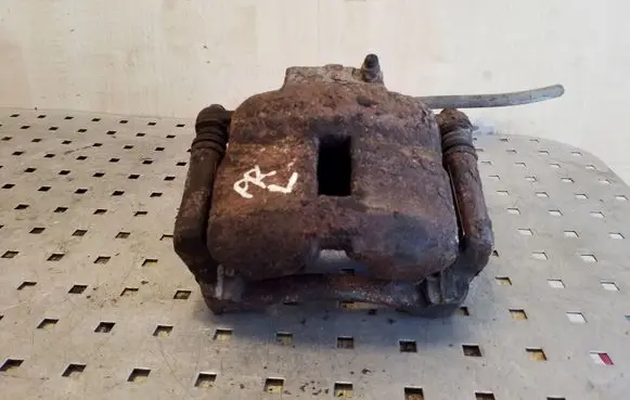 Nissan Almera N16 Front brake caliper