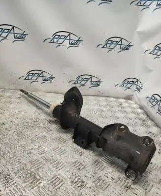 Front shock absorber with coil spring