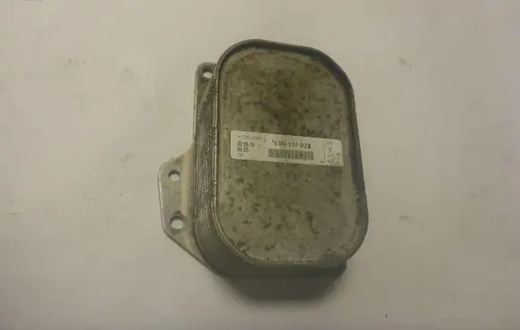 Volkswagen Golf VII Engine oil radiator 03N117021