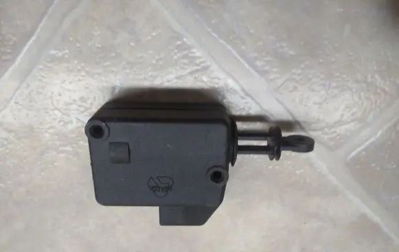 Fuel tank cap lock motor