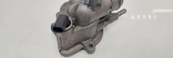 Thermostat/thermostat housing