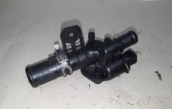 Thermostat/thermostat housing
