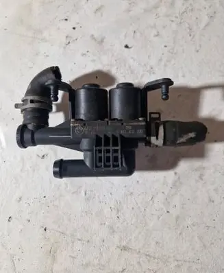 Coolant heater control valve
