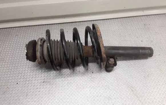 Front shock absorber with coil spring