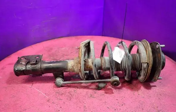 Hyundai Tucson JM Front shock absorber with coil spring