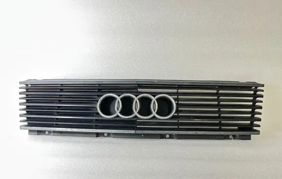 Audi 100 200 5000 C3 Front bumper upper radiator grill 443853655