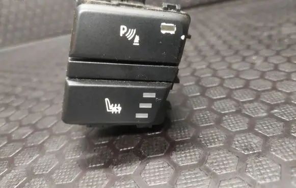 Seat heating switch