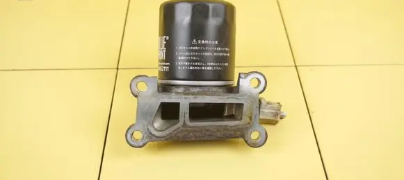 Ford Mondeo MK V Oil filter mounting bracket BS4E6881BB UACA