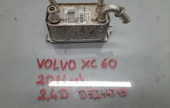 Volvo XC60 Engine oil radiator 6G91-7A095-AD