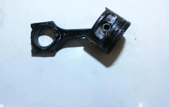 Opel Corsa B Piston with connecting rod