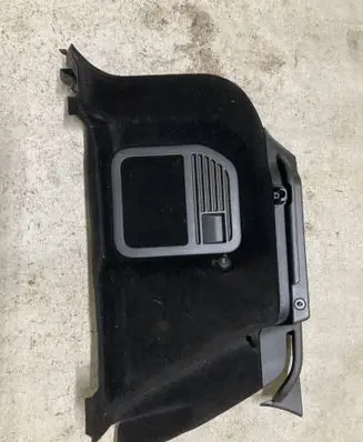 Trunk/boot lower side trim panel