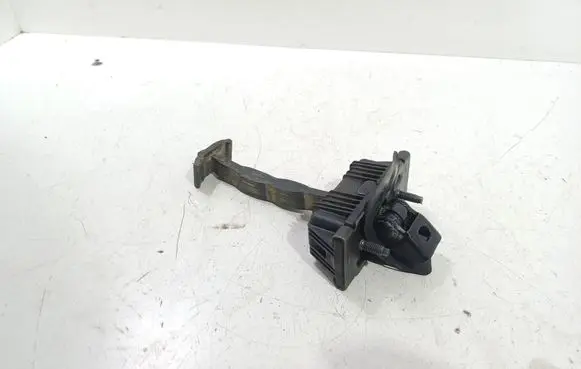 Front door check strap stopper