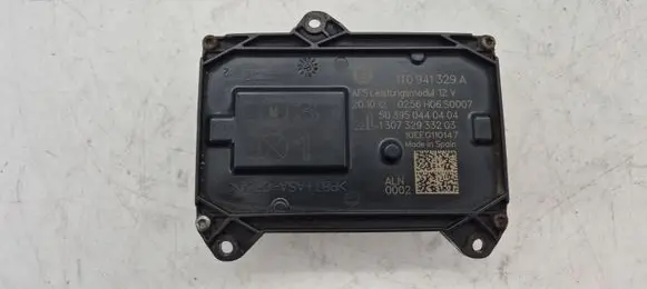 Volkswagen PASSAT B7 Headlight ballast module Xenon 1T0941329A 0256H06S0007