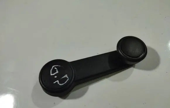 Ford Focus Front door window winding handle 