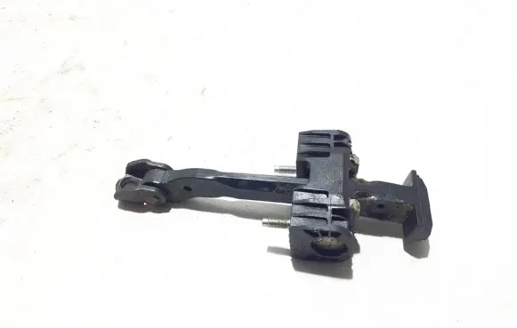 Rear door check strap stopper