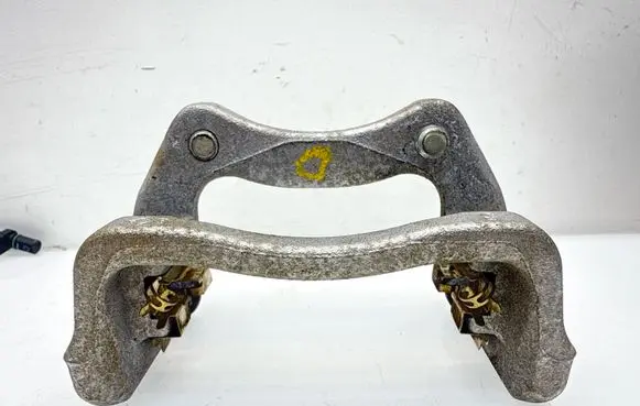 Nissan Juke II F16 Brake caliper pad carrier rear 