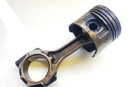 Piston with connecting rod