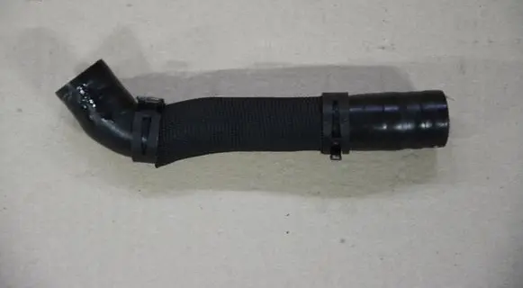 Volkswagen Golf VII Engine coolant pipe/hose 5Q0122157AB