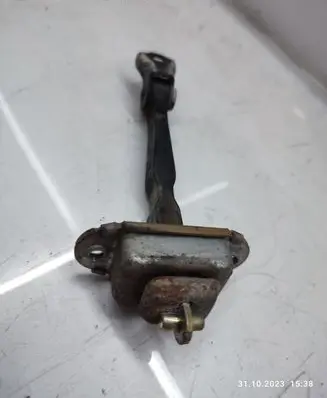 Nissan X-Trail T30 Front door check strap stopper