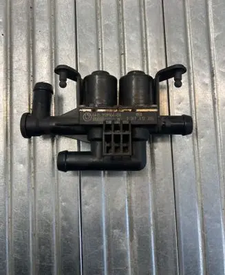 Coolant heater control valve