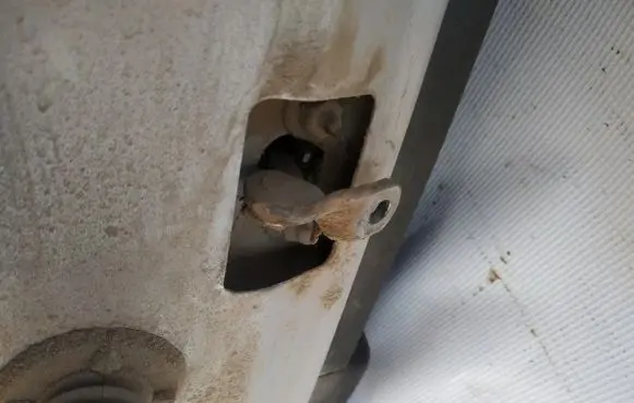 Rear door check strap stopper