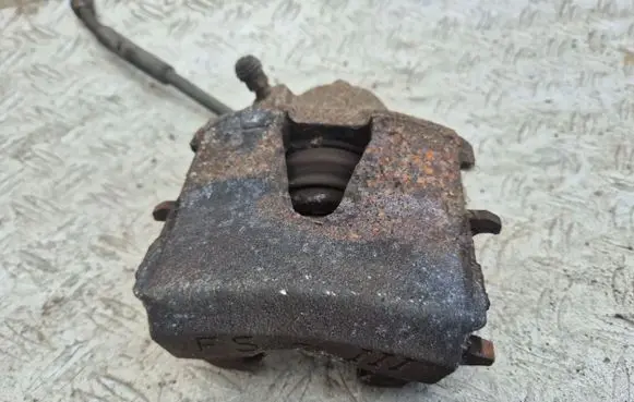 Volkswagen Polo V 6R Front brake caliper