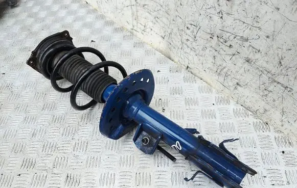 Nissan Juke I F15 Front shock absorber with coil spring 36266230021 11A23