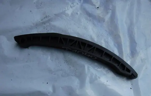 Volkswagen PASSAT B6 Slide rail for timing chain 03C109509M
