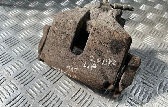Skoda Superb B6 (3T) Front brake caliper