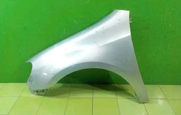 Volkswagen Golf VI Fender PRZOD LEWY