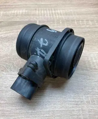 Volkswagen Golf V Mass air flow meter 038906461B 0281002531