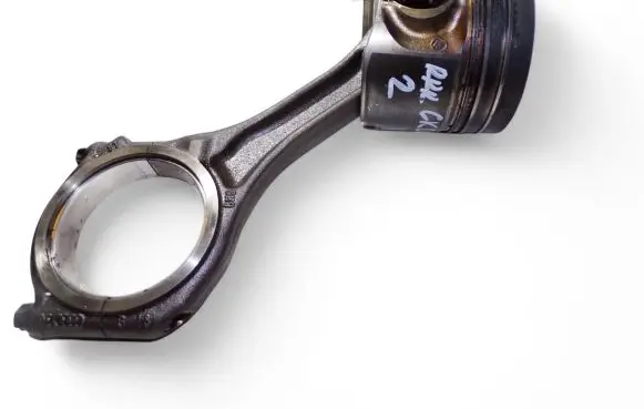Piston with connecting rod