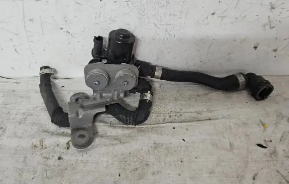 Coolant heater control valve