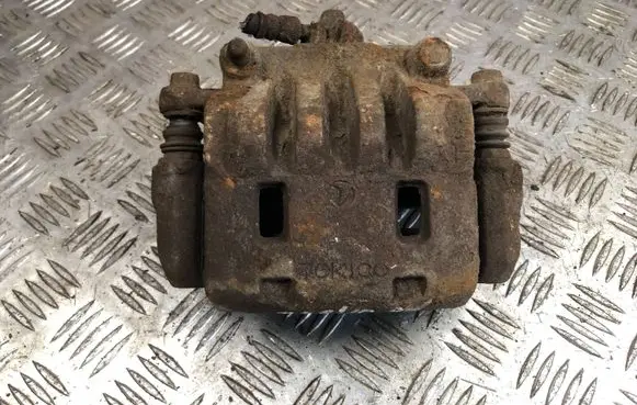 Subaru Impreza III Front brake caliper