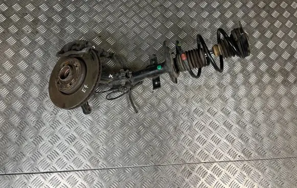 Front wheel hub spindle knuckle