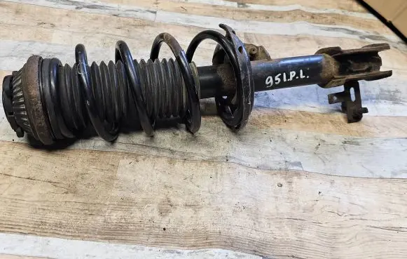 Opel Astra H Front shock absorber with coil spring 22214597