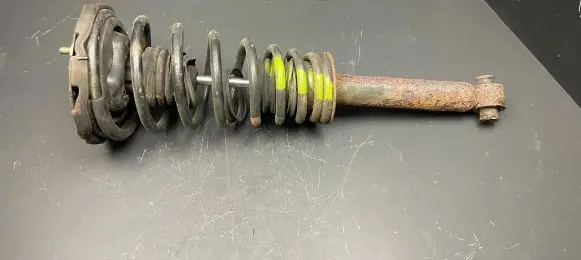 Nissan Primera Front shock absorber/damper 561102F025