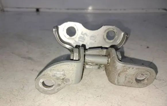 Rear door upper hinge