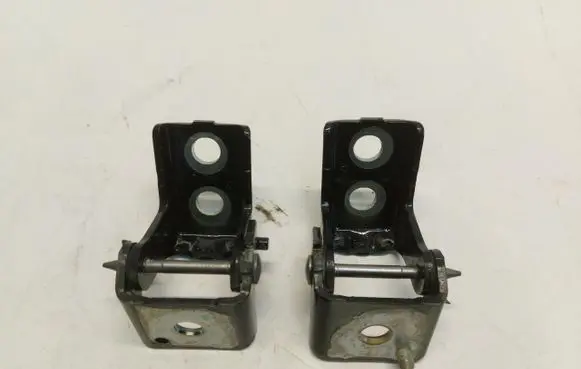 Rear door upper hinge